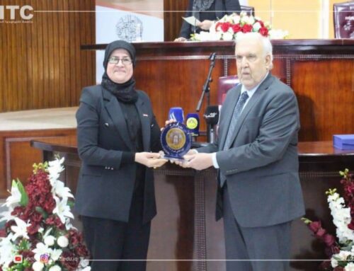 A lecturer at the university receives the Shield of Creativity and Excellence from the Iraqi Scientific Academy